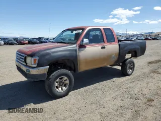 1995 Toyota T100 z VIN JT4VD22F0S0010554, wystawiony jako Copart lot #54718275 z przebiegiem 126 608 mil mil oraz Tytuł czysty. Historia ofert i sprzedaży dostępna na DreamBid. Obrazek 1.