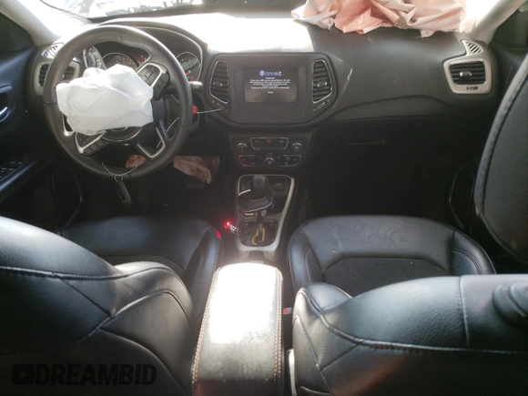 2019 Jeep Compass Latitude with VIN 3C4NJCBB1KT750032, listed as a Copart auction lot 82931994 with 59,293 mi miles and Salvage Title. Bid and sale history available at DreamBid. Image 8.
