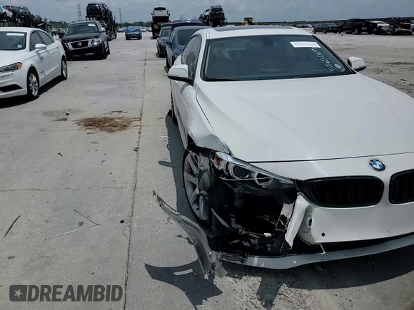 2015 BMW 4 Series 428i с VIN WBA4A5C55FGK16037, выставлен на аукционе Copart как лот 57650695 с пробегом Не указан миль и Списание • Salvage title. История ставок и продаж доступна на DreamBid. Изображение 13.