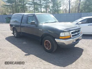 1999 Ford Ranger XL with VIN 1FTYR14V5XPB00021, listed as a IAAI auction lot 42129559 with 181,005 mi miles. Bid and sale history available at carsss.com. Image 1.