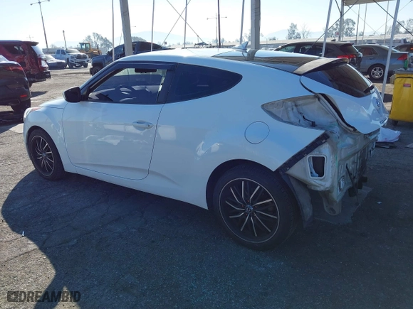 2015 Hyundai Veloster with VIN KMHTC6AD3FU227852, listed as a IAAI auction lot 41657406 with 179,185 mi miles. Bid and sale history available at carsss.com. Image 3.