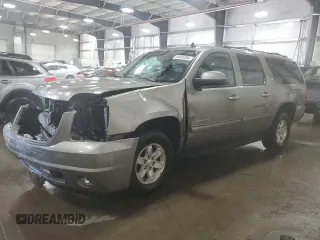 2012 GMC Yukon XL SLT with VIN 1GKS2KE73CR289965, listed as a Copart auction lot 85985984 with 138,742 mi miles and Salvage Title. Bid and sale history available at carsss.com. Image 1.