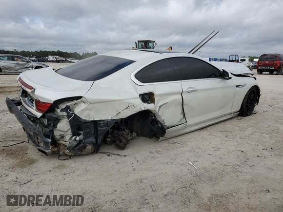 2012 BMW 6 Series 650i z VIN WBALX3C50CC528560, wystawiony jako Copart lot #81046454 z przebiegiem Nie podano mil oraz Nie do naprawy • Non repairable. Historia ofert i sprzedaży dostępna na DreamBid. Obrazek 3.