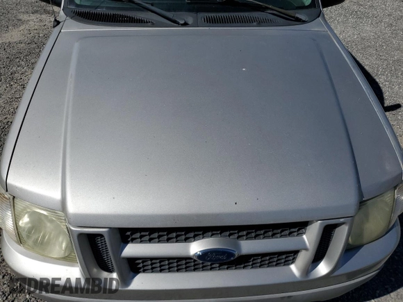 2004 Ford Explorer Sport Trac XLS z VIN 1FMDU77K24UA03885, wystawiony jako Copart lot #75434684 z przebiegiem Nie podano mil oraz Szkoda całkowita • Salvage title. Historia ofert i sprzedaży dostępna na DreamBid. Obrazek 11.