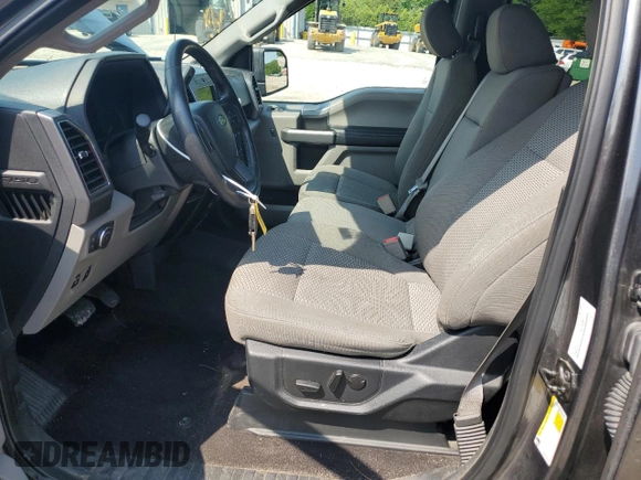 2019 Ford F-150 XL with VIN 1FTEW1EP7KFA47638, listed as a Copart auction lot 60193125 with 127,022 mi miles and Salvage title. Bid and sale history available at DreamBid. Image 7.