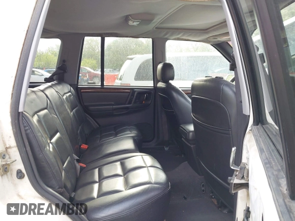 1998 Jeep Grand Cherokee Limited z VIN 1J4GZ78Y2WC164021, wystawiony jako IAAI lot #42109012 z przebiegiem Nie podano mil oraz . Historia ofert i sprzedaży dostępna na DreamBid. Obrazek 8.