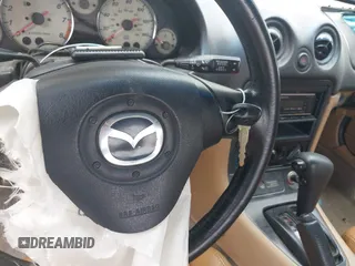 2002 Mazda MX-5 Miata Cloth with VIN JM1NB353520221312, listed as a IAAI auction lot 42410028 with 99,375 mi miles and . Bid and sale history available at DreamBid. Image 11.