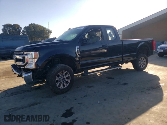 2021 Ford Super Duty F-250 SRW XL with VIN 1FT7X2BN0MEC62141, listed as a Copart auction lot 77142804 with 59,933 mi miles and Salvage Title. Bid and sale history available at carsss.com. Image 1.