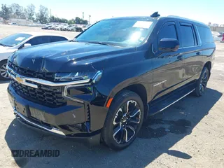 2023 Chevrolet Suburban LS z VIN 1GNSCBKD3PR457569, wystawiony jako IAAI lot #42225571 z przebiegiem 53 410 mil mil oraz . Historia ofert i sprzedaży dostępna na DreamBid. Obrazek 2.