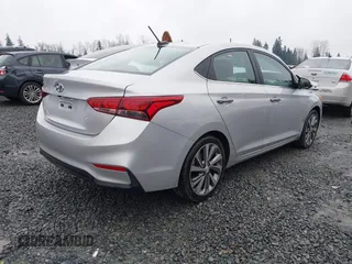 2021 Hyundai Accent Limited with VIN 3KPC34A6XME132842, listed as a IAAI auction lot 41268124 with 52,698 mi miles. Bid and sale history available at carsss.com. Image 4.