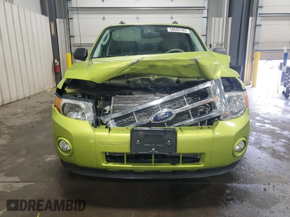 2012 Ford Escape XLT with VIN 1FMCU9D7XCKA07488, listed as a Copart auction lot 58605185 with 144,578 mi miles and Salvage title. Bid and sale history available at DreamBid. Image 5.