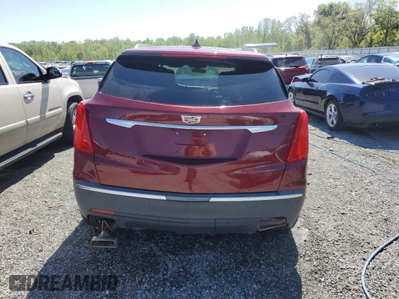 2018 Cadillac XT5 FWD with VIN 1GYKNARS1JZ205595, listed as a Copart auction lot 52428565 with 106,927 mi miles and Salvage title. Bid and sale history available at DreamBid. Image 6.