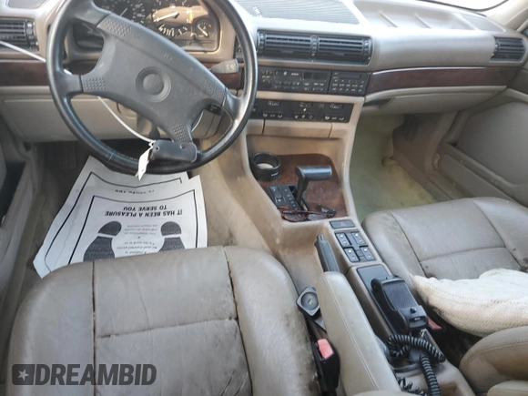1991 BMW 7 Series z VIN WBAGC4310MDC27706, wystawiony jako Copart lot #81496754 z przebiegiem Nie podano mil oraz Nie do naprawy • Non repairable. Historia ofert i sprzedaży dostępna na DreamBid. Obrazek 8.