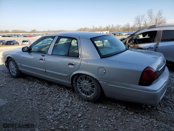 2010 Mercury Grand Marquis LS with VIN 2MEBM7FV8AX601912, listed as a Copart auction lot 50632795 with 60,828 mi miles and Salvage Title. Bid and sale history available at carsss.com. Image 2.
