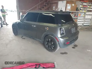 2009 MINI Hardtop S with VIN WMWMF73539TT98930, listed as a IAAI auction lot 42439606 with 152,954 mi miles and . Bid and sale history available at DreamBid. Image 3.