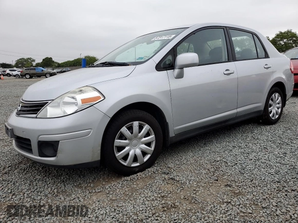 2011 Nissan Versa S with VIN 3N1BC1AP9BL458761, listed as a Copart auction lot 57317115 with 122,606 mi miles and Salvage title. Bid and sale history available at DreamBid. Image 1.