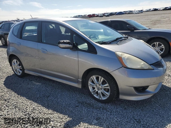 2009 Honda Fit Sport z VIN JHMGE88489S010278, wystawiony jako Copart lot #52251405 z przebiegiem 120 511 mil mil oraz Szkoda całkowita • Salvage title. Historia ofert i sprzedaży dostępna na DreamBid. Obrazek 4.