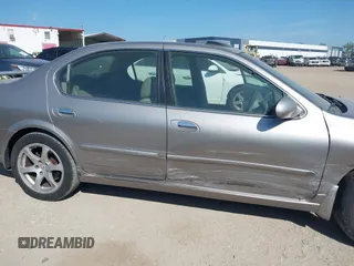 2003 Nissan Maxima GLE z VIN JN1DA31A83T411224, wystawiony jako IAAI lot #41905714 z przebiegiem Nie podano mil oraz . Historia ofert i sprzedaży dostępna na DreamBid. Obrazek 17.