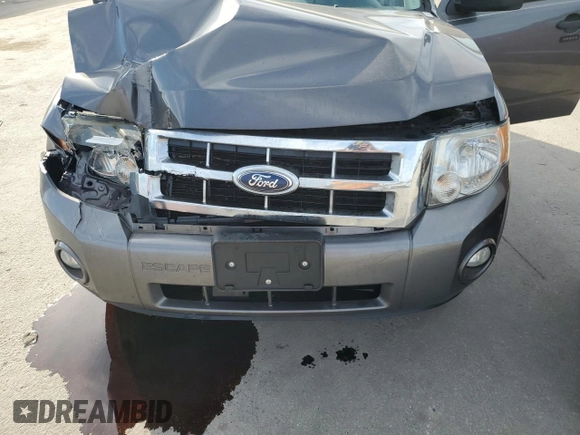 2012 Ford Escape XLT with VIN 1FMCU0D77CKB94023, listed as a Copart auction lot 54417045 with 150,933 mi miles and Salvage title. Bid and sale history available at DreamBid. Image 12.