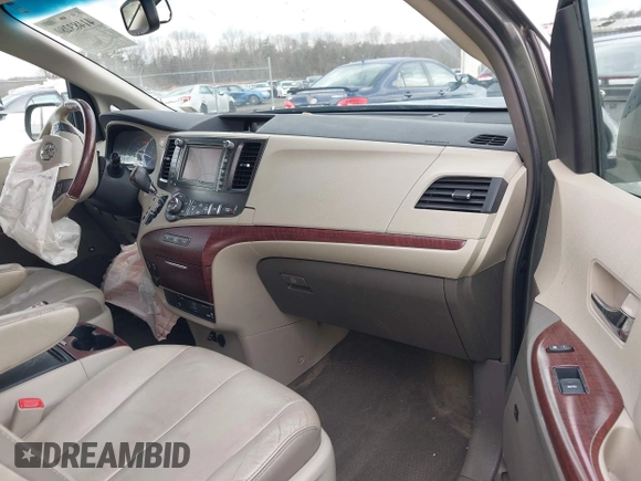 2013 Toyota Sienna XLE with VIN 5TDDK3DC7DS068591, listed as a IAAI auction lot 41483280 with 197,599 mi miles and . Bid and sale history available at DreamBid. Image 5.