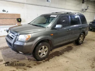 2007 Honda Pilot EX-L z VIN 2HKYF18587H508933, wystawiony jako Copart lot #57240145 z przebiegiem 176 380 mil mil oraz Czysty tytuł • Clean title. Historia ofert i sprzedaży dostępna na DreamBid. Obrazek 1.