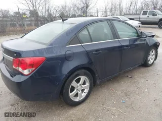 2011 Chevrolet Cruze LT w/2LT with VIN 1G1PG5S97B7160785, listed as a IAAI auction lot 41813953 with 137,282 mi miles. Bid and sale history available at carsss.com. Image 4.