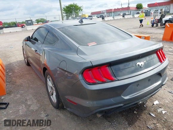 2021 Ford Mustang EcoBoost with VIN 1FA6P8TH9M5133781, listed as a IAAI auction lot 42158034 with 31,648 mi miles and . Bid and sale history available at DreamBid. Image 3.