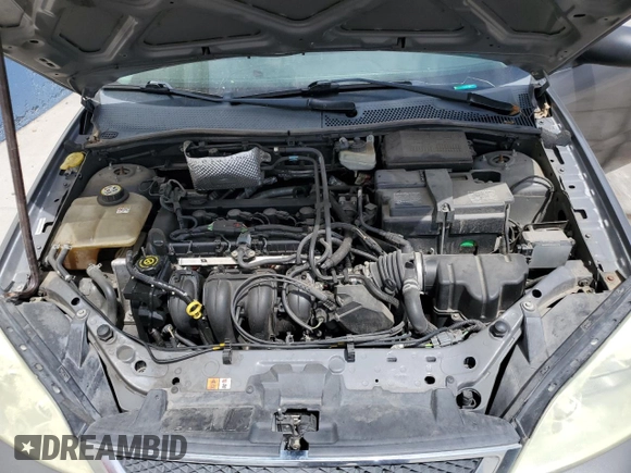 2006 Ford Focus SE with VIN 1FAHP36N56W223049, listed as a Copart auction lot 61211745 with 185,609 mi miles and Salvage title. Bid and sale history available at DreamBid. Image 11.