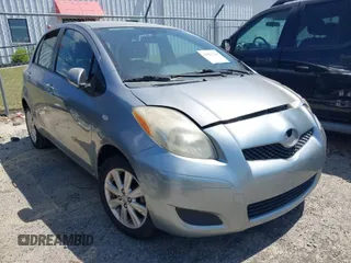 2009 Toyota Yaris with VIN JTDKT903795267473, listed as a IAAI auction lot 42061180 with 203,275 mi miles. Bid and sale history available at carsss.com. Image 1.