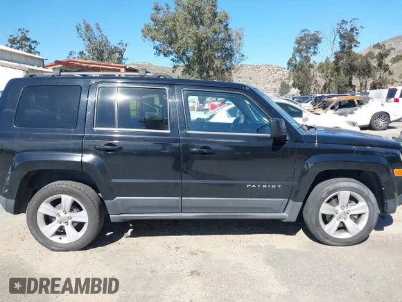 2013 Jeep Patriot Latitude with VIN 1C4NJPFA5DD230031, listed as a IAAI auction lot 41641768 with 153,910 mi miles. Bid and sale history available at carsss.com. Image 13.