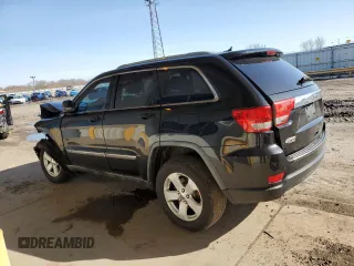 2012 Jeep Grand Cherokee Laredo with VIN 1C4RJEAG2CC215525, listed as a Copart auction lot 51876105 with 148,659 mi miles and Salvage Title. Bid and sale history available at carsss.com. Image 2.