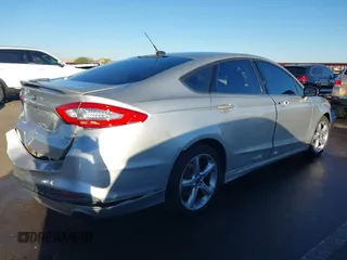 2014 Ford Fusion SE with VIN 1FA6P0HD6E5361164, listed as a IAAI auction lot 41647517 with 133,521 mi miles. Bid and sale history available at carsss.com. Image 4.