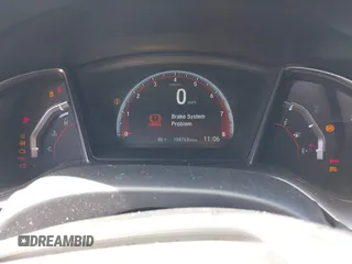 2018 Honda Civic Si with VIN 2HGFC1E53JH700251, listed as a IAAI auction lot 42043732 with 104,763 mi miles and . Bid and sale history available at DreamBid. Image 7.