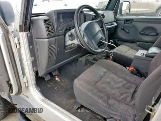 2004 Jeep Wrangler X z VIN 1J4FA39S34P702186, wystawiony jako Copart lot #59561675 z przebiegiem 202 214 mil mil oraz Szkoda całkowita • Salvage title. Historia ofert i sprzedaży dostępna na DreamBid. Obrazek 8.