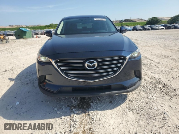 2016 Mazda CX-9 Touring z VIN JM3TCACY8G0117354, wystawiony jako Copart lot #56660935 z przebiegiem 112 365 mil mil oraz Szkoda całkowita • Salvage title. Historia ofert i sprzedaży dostępna na DreamBid. Obrazek 5.