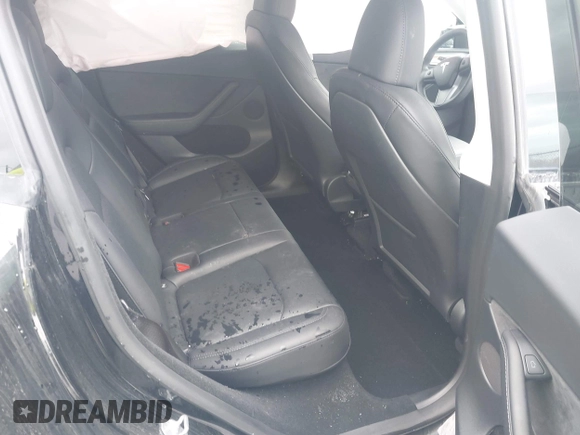 2023 Tesla Model Y Long Range with VIN 7SAYGDEE5PF766685, listed as a IAAI auction lot 41933729 with 25,959 mi miles and . Bid and sale history available at DreamBid. Image 8.