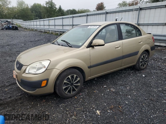 2009 Kia Rio LX with VIN KNADE223096485561, listed as a Copart auction lot 73412874 with 137,858 mi miles and Salvage Title. Bid and sale history available at DreamBid. Image 1.