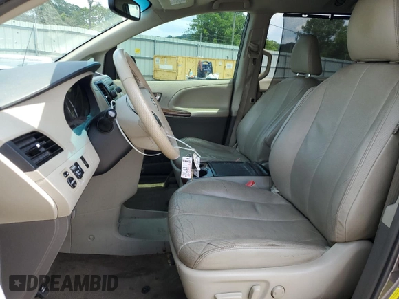 2014 Toyota Sienna XLE with VIN 5TDYK3DC6ES456558, listed as a Copart auction lot 63106085 with 231,260 mi miles and Salvage title. Bid and sale history available at DreamBid. Image 7.