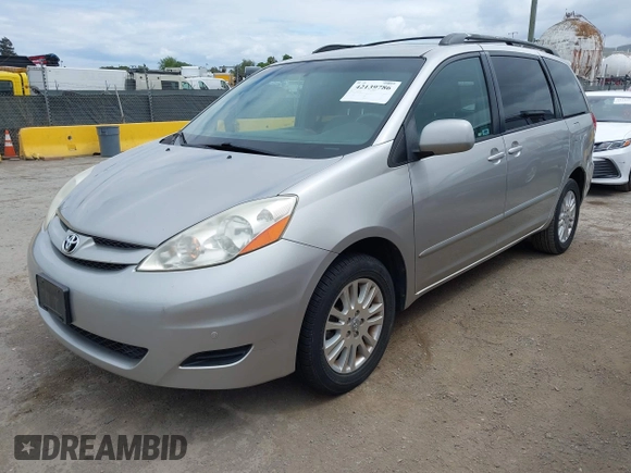 2009 Toyota Sienna XLE with VIN 5TDBK22C89S022909, listed as a IAAI auction lot 42139786 with 107,247 mi miles and . Bid and sale history available at DreamBid. Image 2.