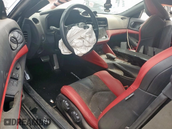 2024 Nissan Z Performance z VIN JN1BZ4BH7RM364076, wystawiony jako Copart lot #55272545 z przebiegiem 21 105 mil mil oraz Czysty tytuł • Clean title. Historia ofert i sprzedaży dostępna na DreamBid. Obrazek 8.