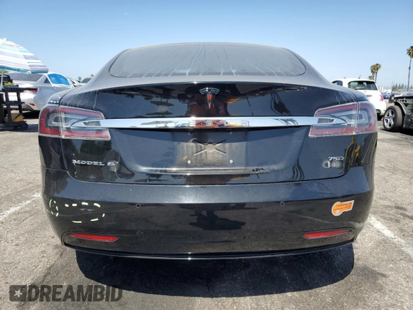 2018 Tesla Model S 75D с VIN 5YJSA1E24JF248762, выставлен на аукционе Copart как лот 61501075 с пробегом 63 802 миль миль и Списание • Salvage title. История ставок и продаж доступна на DreamBid. Изображение 6.