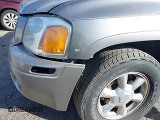 2003 GMC Envoy SLE with VIN 1GKDT13S132377154, listed as a IAAI auction lot 41484891 with 226,008 mi miles. Bid and sale history available at carsss.com. Image 6.