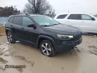 2020 Jeep Cherokee Latitude with VIN 1C4PJMCX9LD584410, listed as a IAAI auction lot 41710754 with 73,325 mi miles. Bid and sale history available at carsss.com. Image 1.