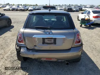2013 MINI Hardtop with VIN WMWSU3C57DT678736, listed as a Copart auction lot 52586285 with 64,563 mi miles and Salvage Title. Bid and sale history available at DreamBid. Image 6.