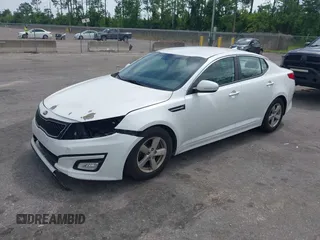 2015 Kia Optima LX with VIN 5XXGM4A71FG504439, listed as a IAAI auction lot 42470149 with 142,076 mi miles and . Bid and sale history available at DreamBid. Image 2.