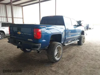 2015 Chevrolet Silverado 1500 High Country with VIN 3GCUKTEJ0FG491799, listed as a IAAI auction lot 41615824 with 118,745 mi miles. Bid and sale history available at carsss.com. Image 4.