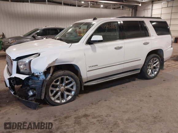 2015 GMC Yukon SLE with VIN 1GKS2AKC6FR103447, listed as a IAAI auction lot 41596220 with 104,209 mi miles. Bid and sale history available at carsss.com. Image 2.
