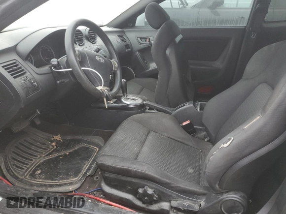 2008 Hyundai Tiburon GS z VIN KMHHM66DX8U290154, wystawiony jako Copart lot #67054434 z przebiegiem 191 963 mil mil oraz Nie do naprawy • Non repairable. Historia ofert i sprzedaży dostępna na DreamBid. Obrazek 7.