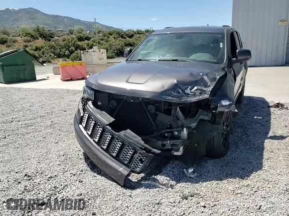 2018 Jeep Grand Cherokee Altitude with VIN 1C4RJFAG5JC320742, listed as a Copart auction lot 56988195 with 140,320 mi miles and Salvage title. Bid and sale history available at DreamBid. Image 14.