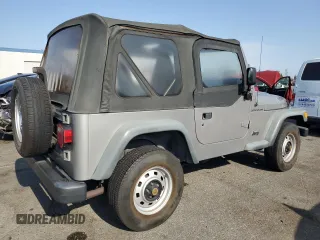 2000 Jeep Wrangler SE with VIN 1J4FA29P3YP770094, listed as a Copart auction lot 65419385 with 150,364 mi miles and Clean title. Bid and sale history available at DreamBid. Image 3.